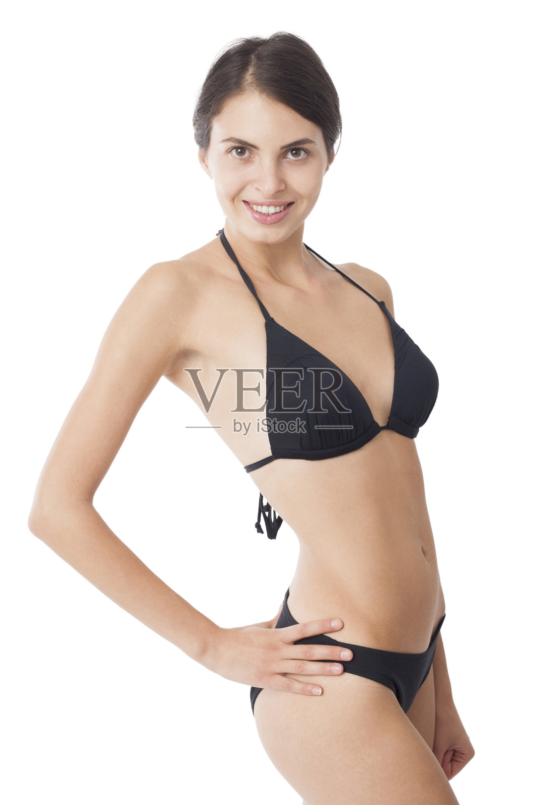 惊人的黑发在黑色比基尼摆姿势照片摄影图片