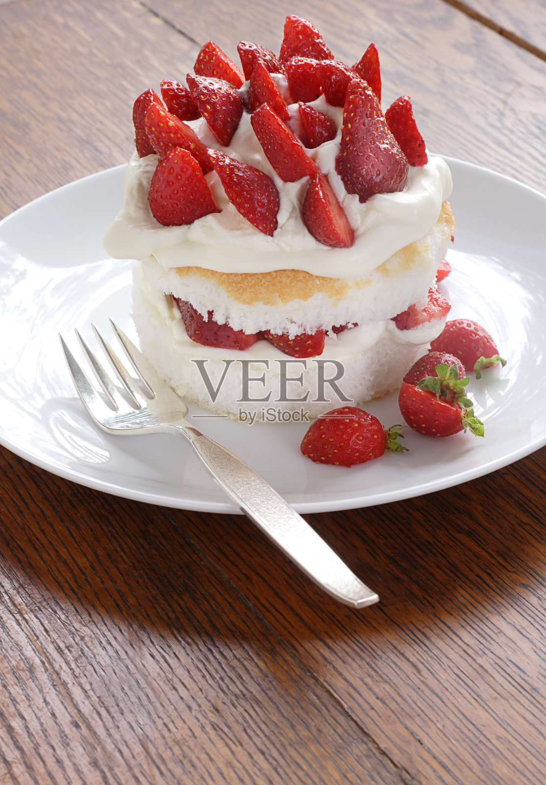 草莓娃娃照片摄影图片