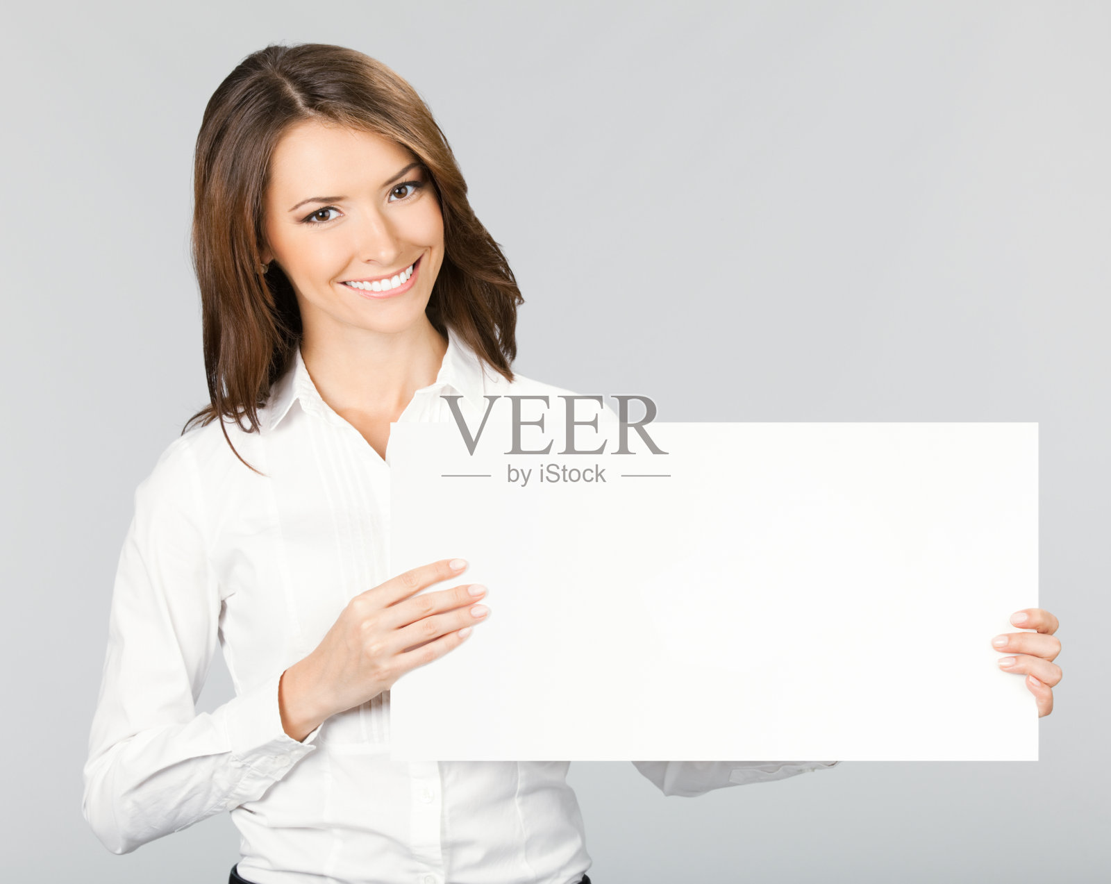 女商人展示招牌,灰色照片摄影图片