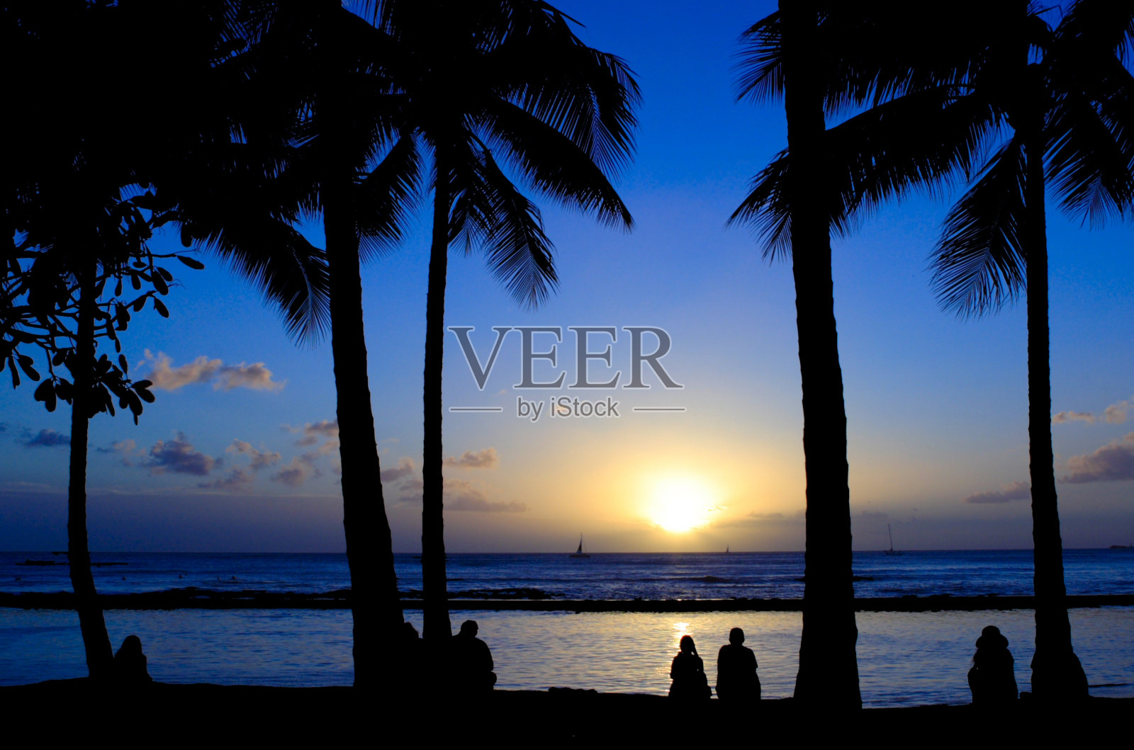 日落在威基基海滩照片摄影图片