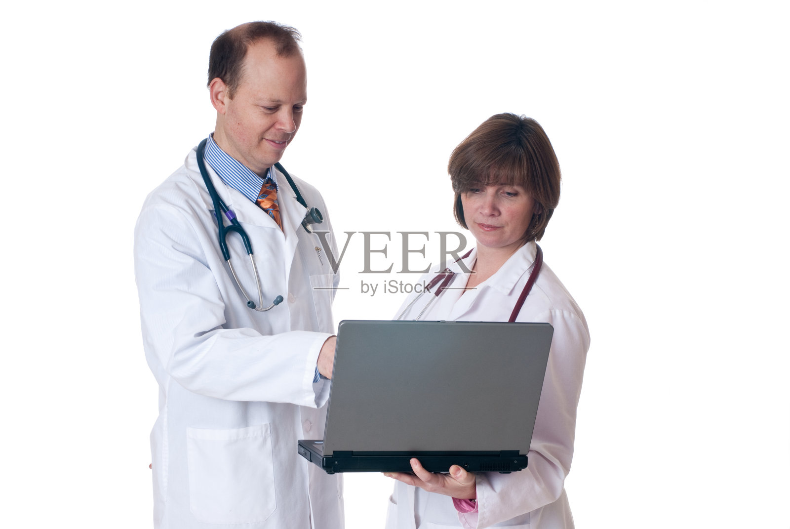 两个医生在看笔记本电脑照片摄影图片