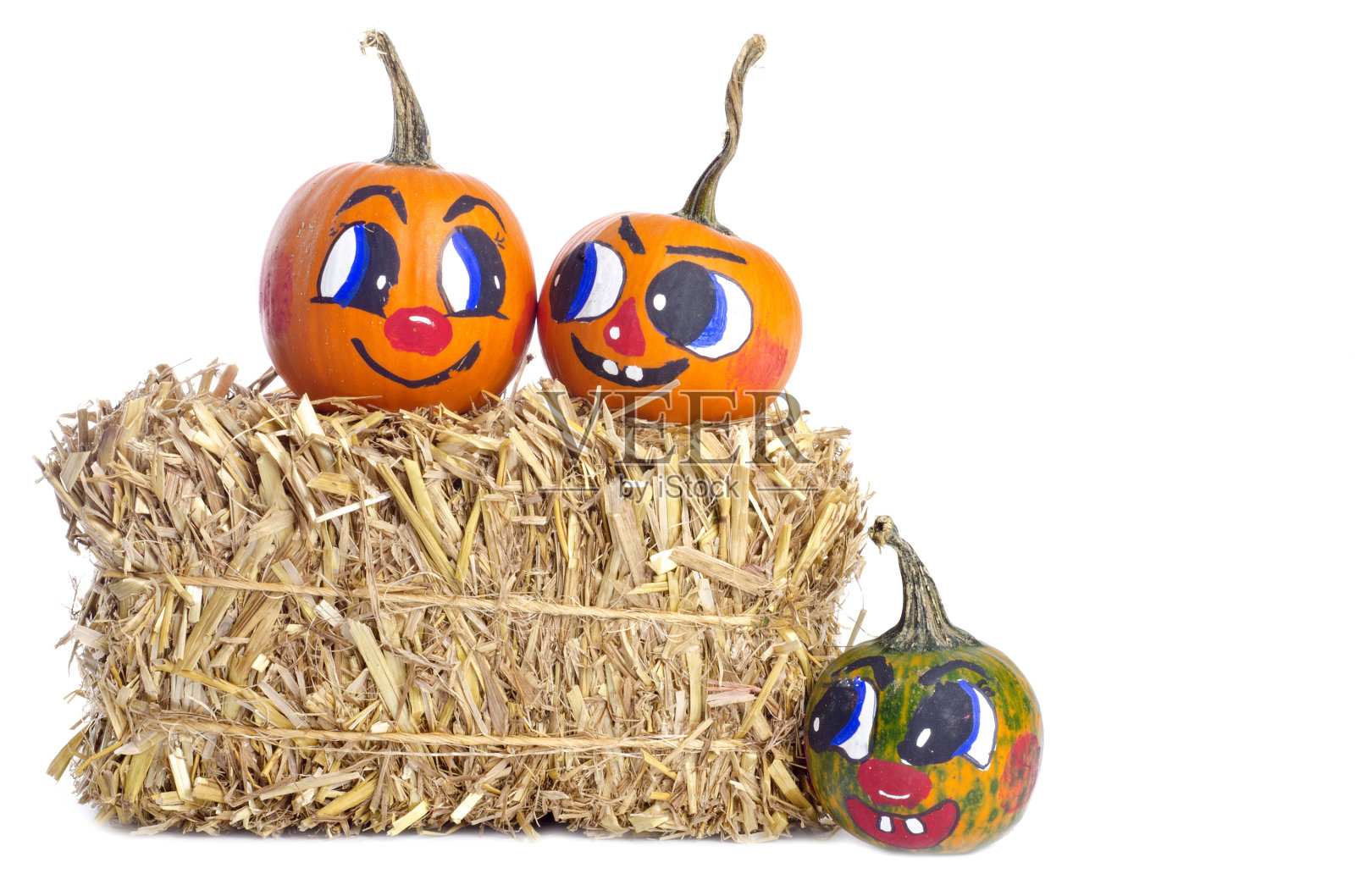 南瓜脸和一捆干草照片摄影图片