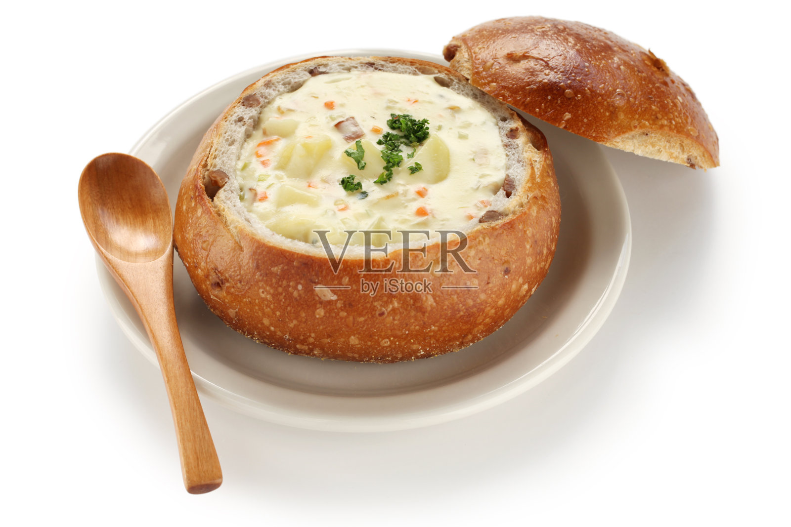 蛤蜊杂烩在酸面包碗里照片摄影图片