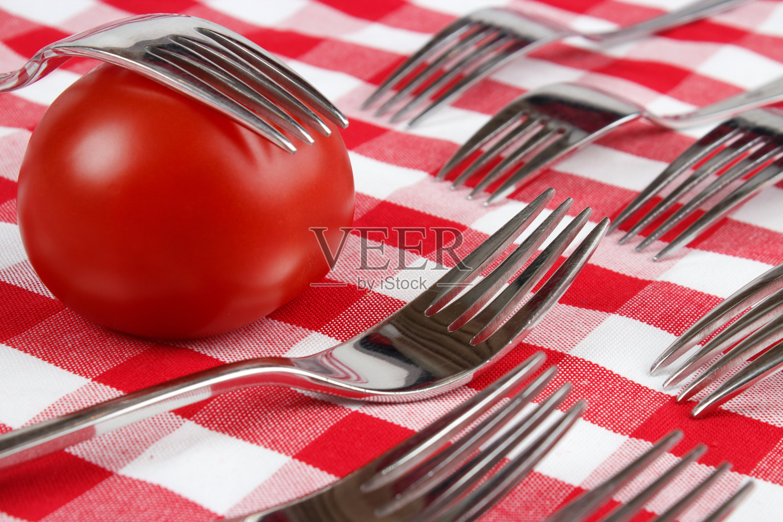 番茄和叉子照片摄影图片