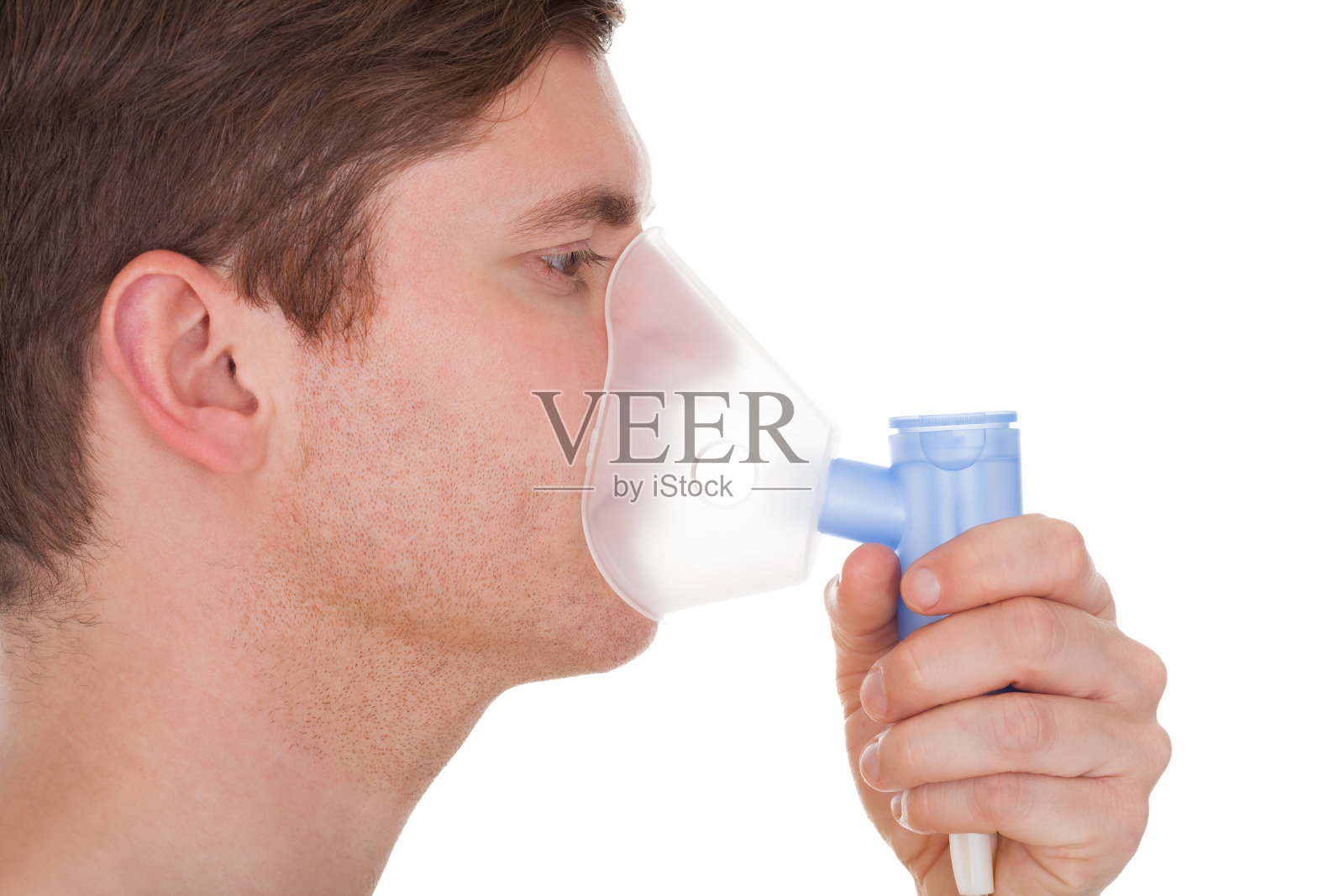 戴着氧气面罩的年轻人照片摄影图片