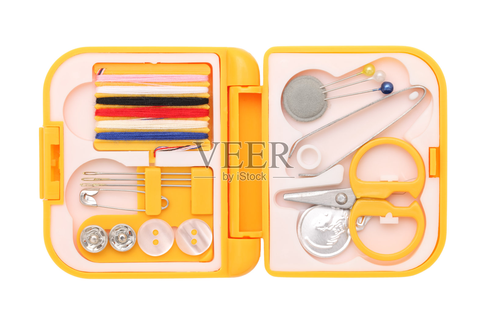 白底上的针线包照片摄影图片