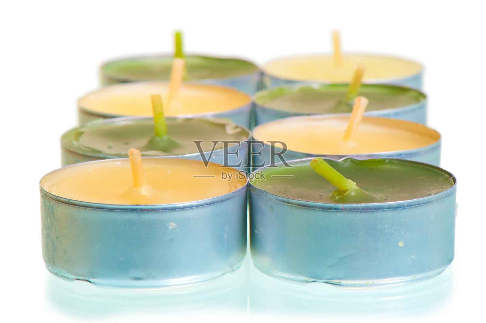 新蜡烛在白色背景上拍摄照片摄影图片