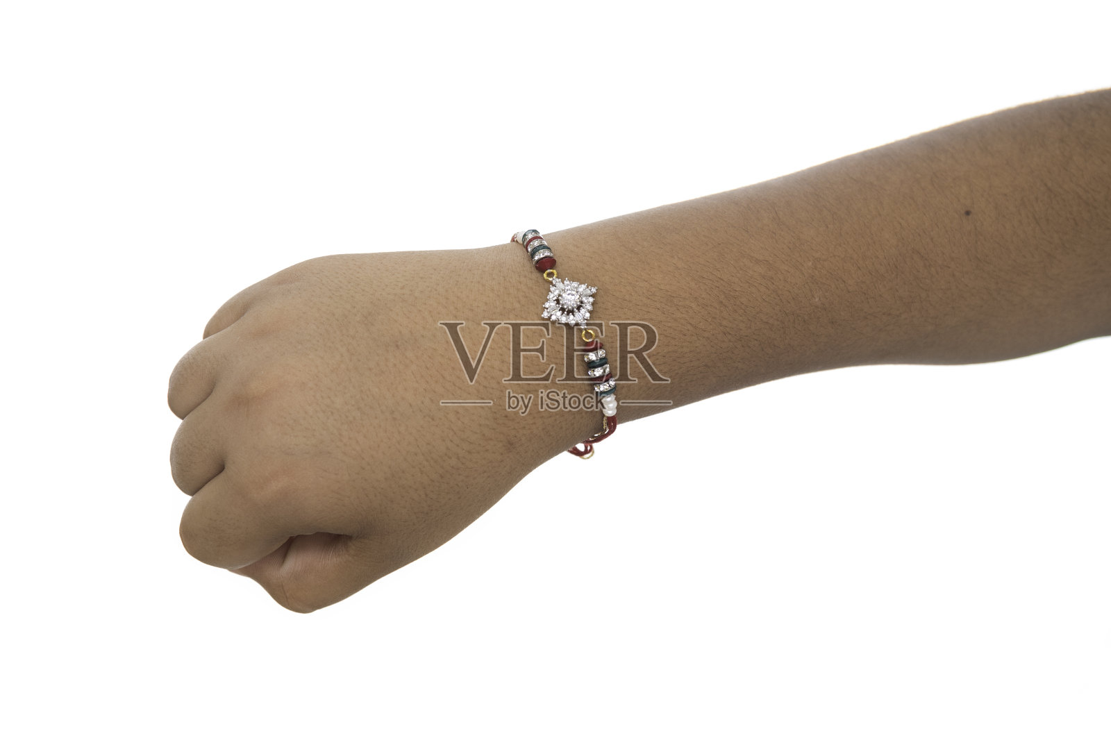 手戴Rakhi照片摄影图片