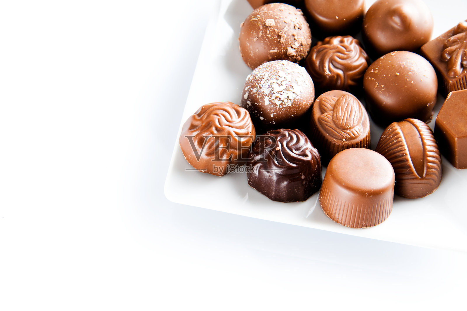 豪华的甜巧克力果仁糖照片摄影图片