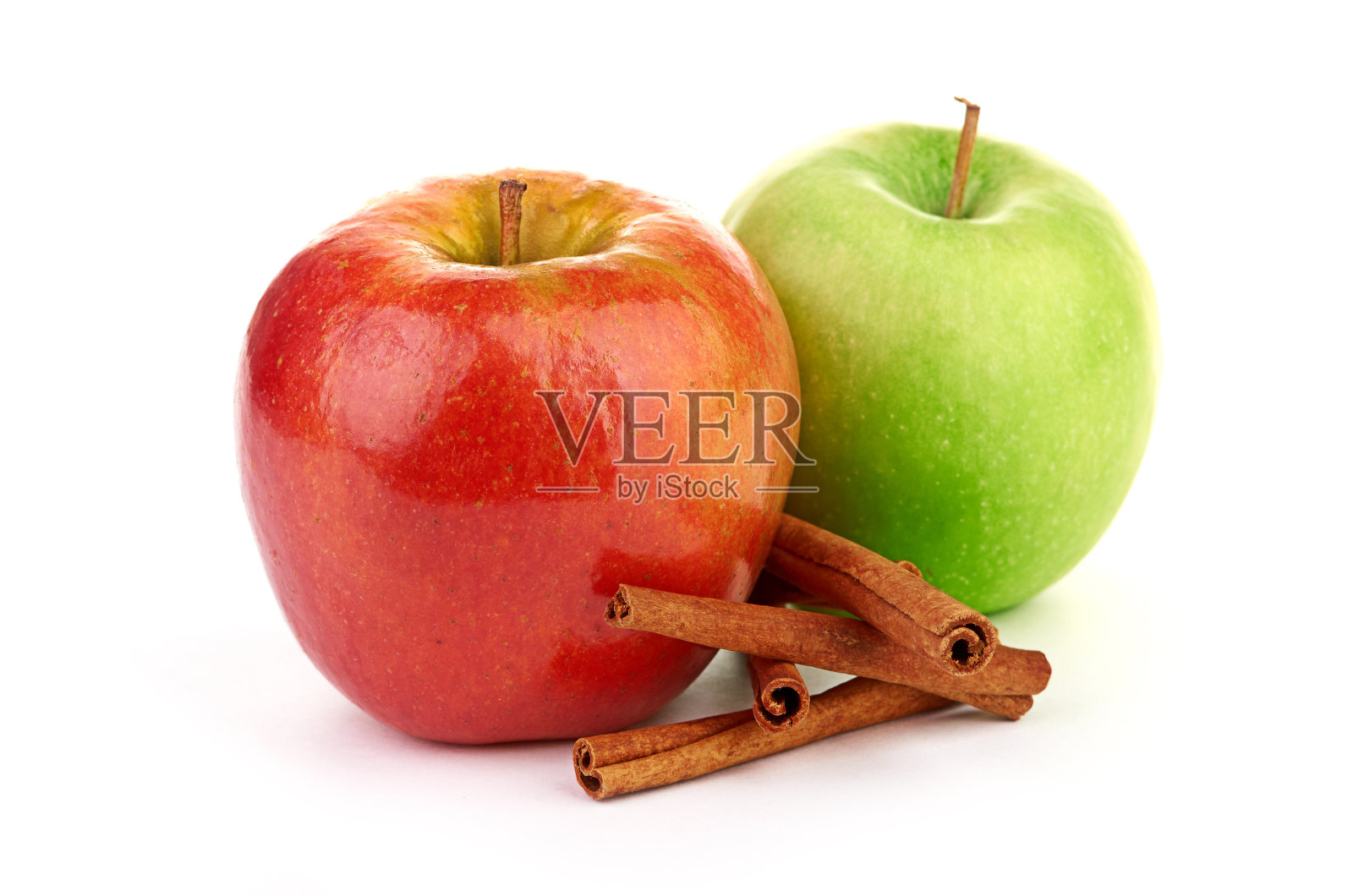 红绿苹果,肉桂棒照片摄影图片