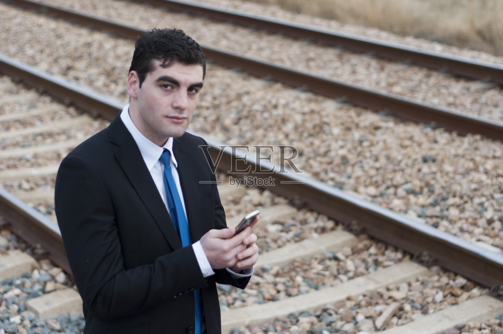 商人使用智能手机照片摄影图片