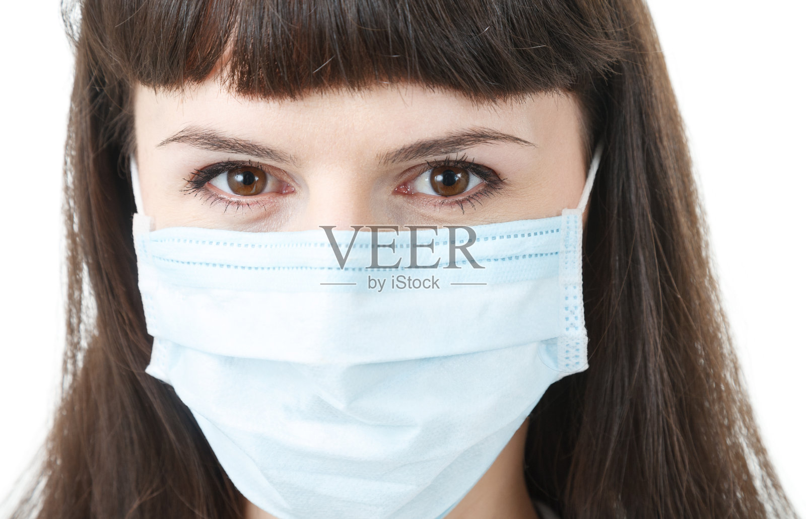 戴面具的年轻女性照片摄影图片