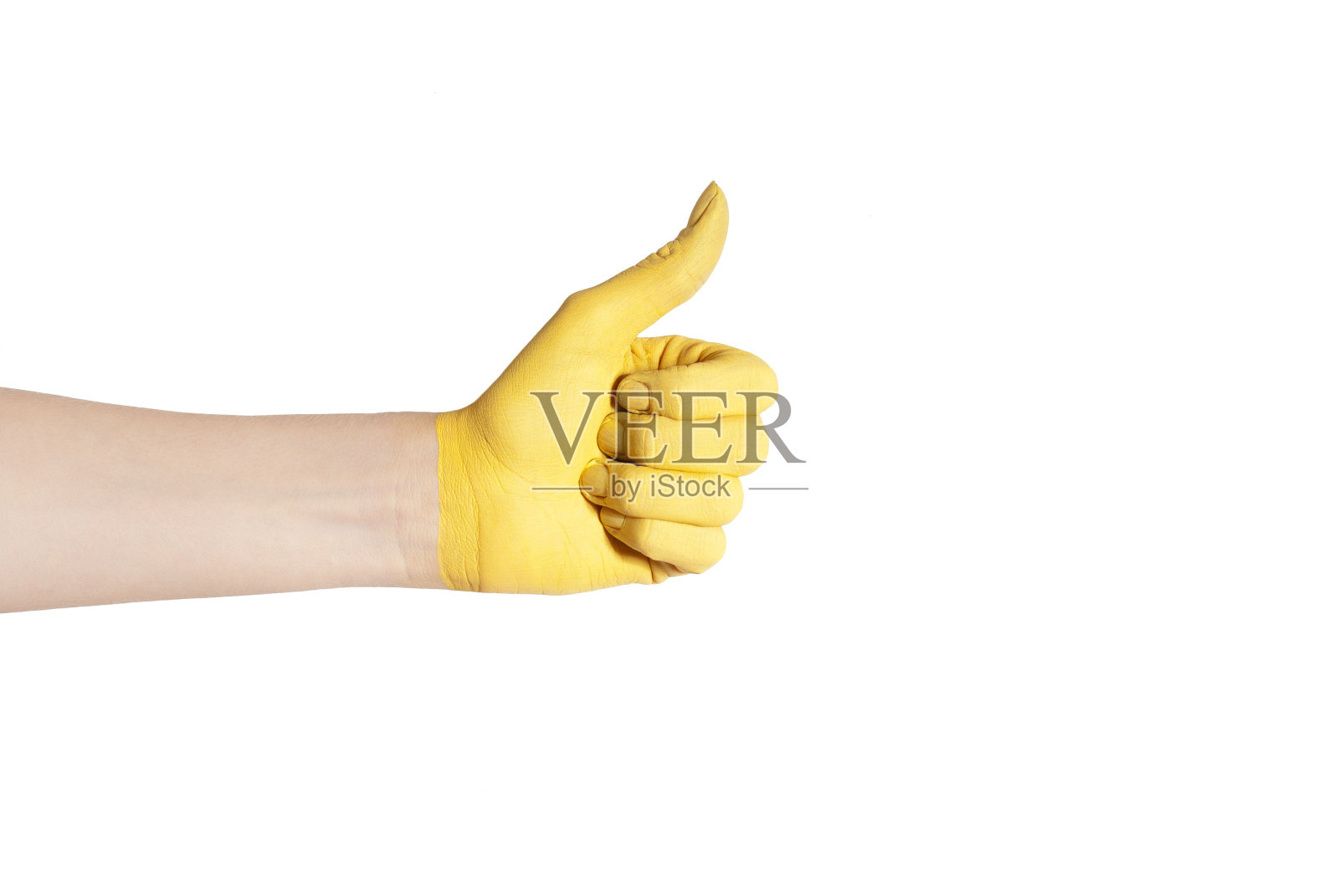 黄色伸出大拇指照片摄影图片