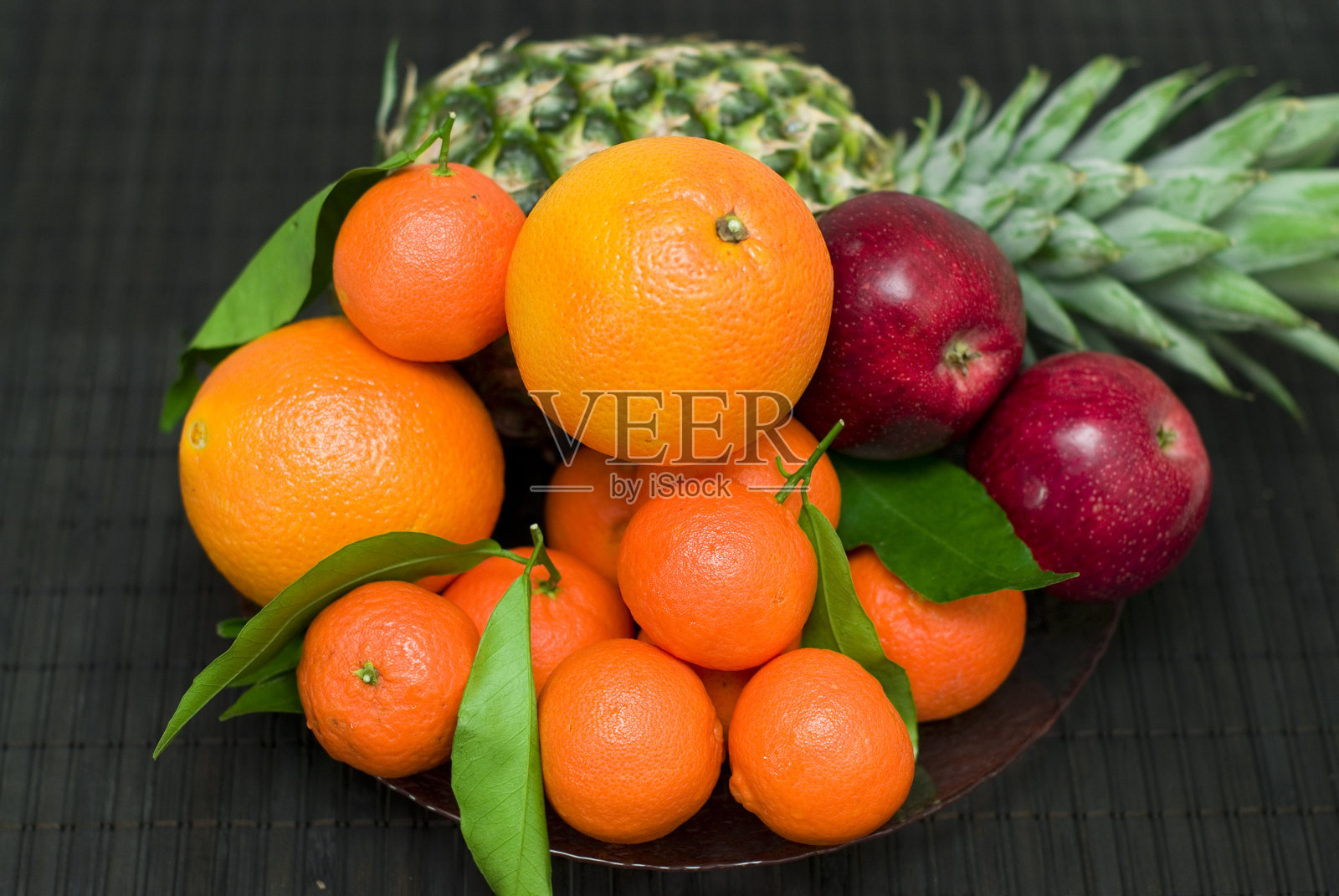 新鲜的桔子,苹果和菠萝照片摄影图片