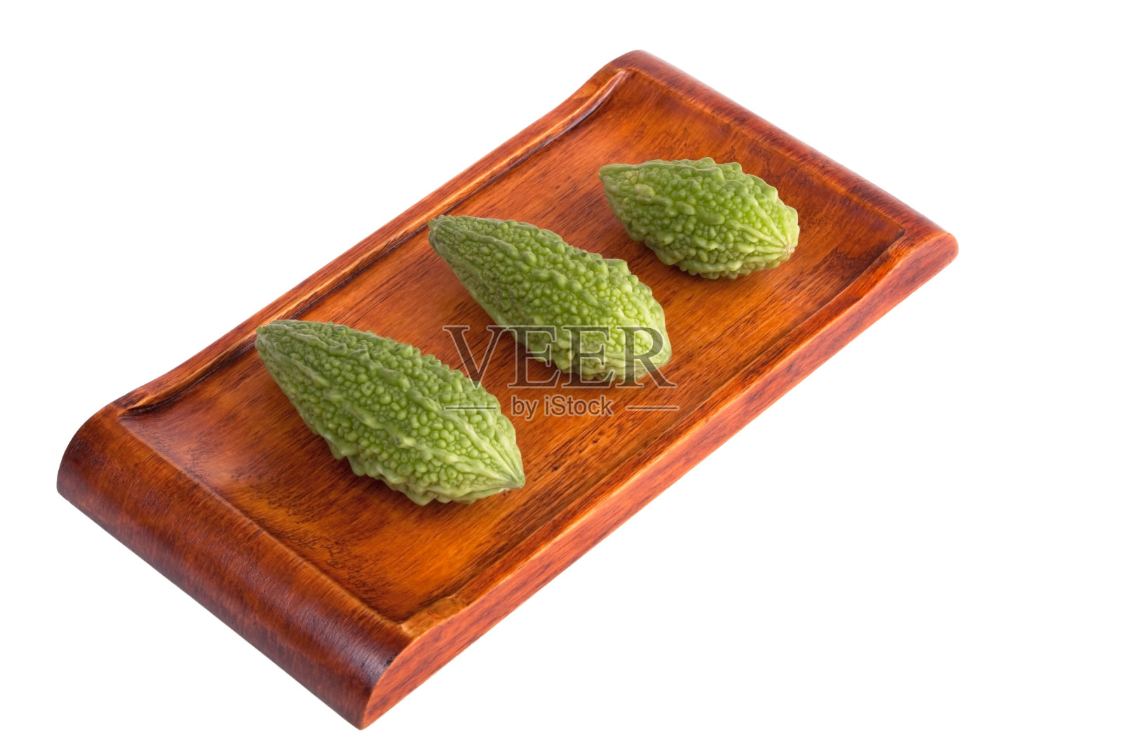 木盘上的苦瓜照片摄影图片