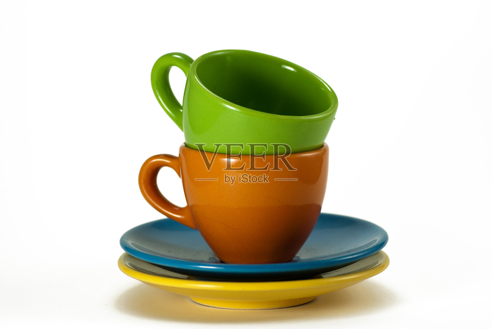 两个咖啡杯和咖啡碟。白色背景。照片摄影图片