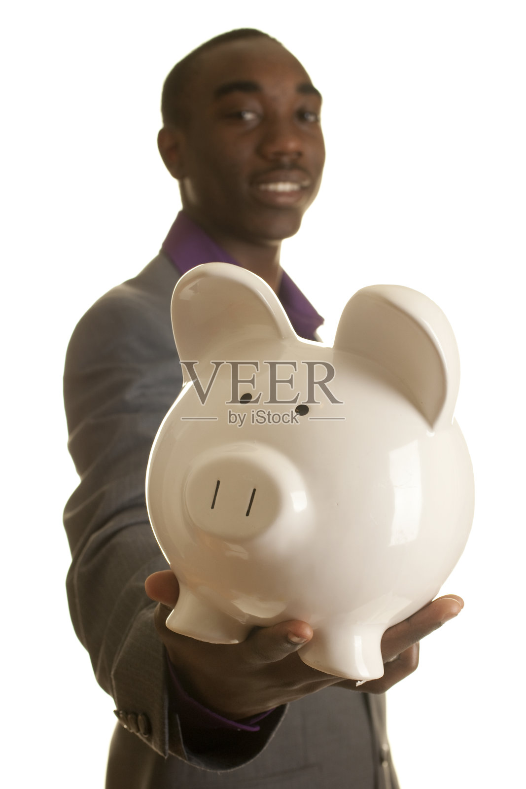 拿着储蓄罐的非裔美国少年照片摄影图片