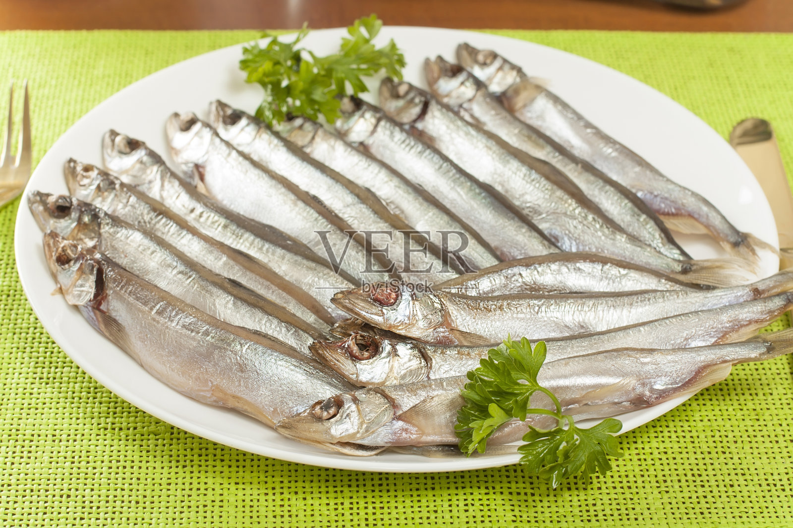 鳕鱼干毛鳞鱼照片摄影图片