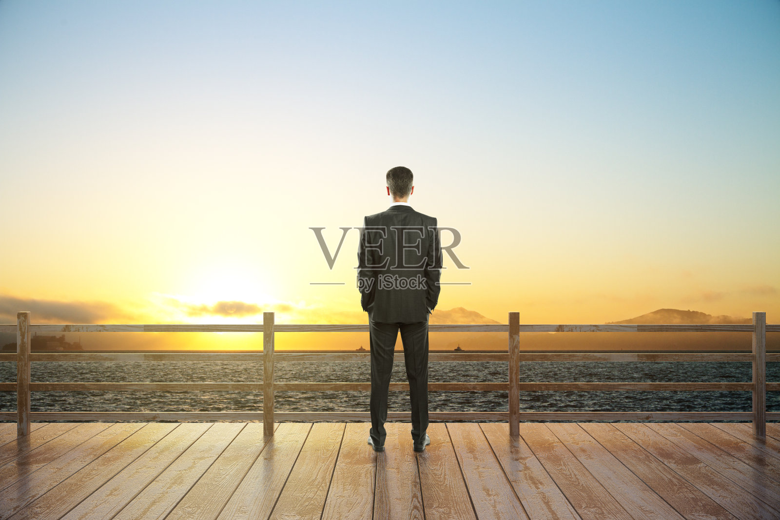 日落景观和商人照片摄影图片