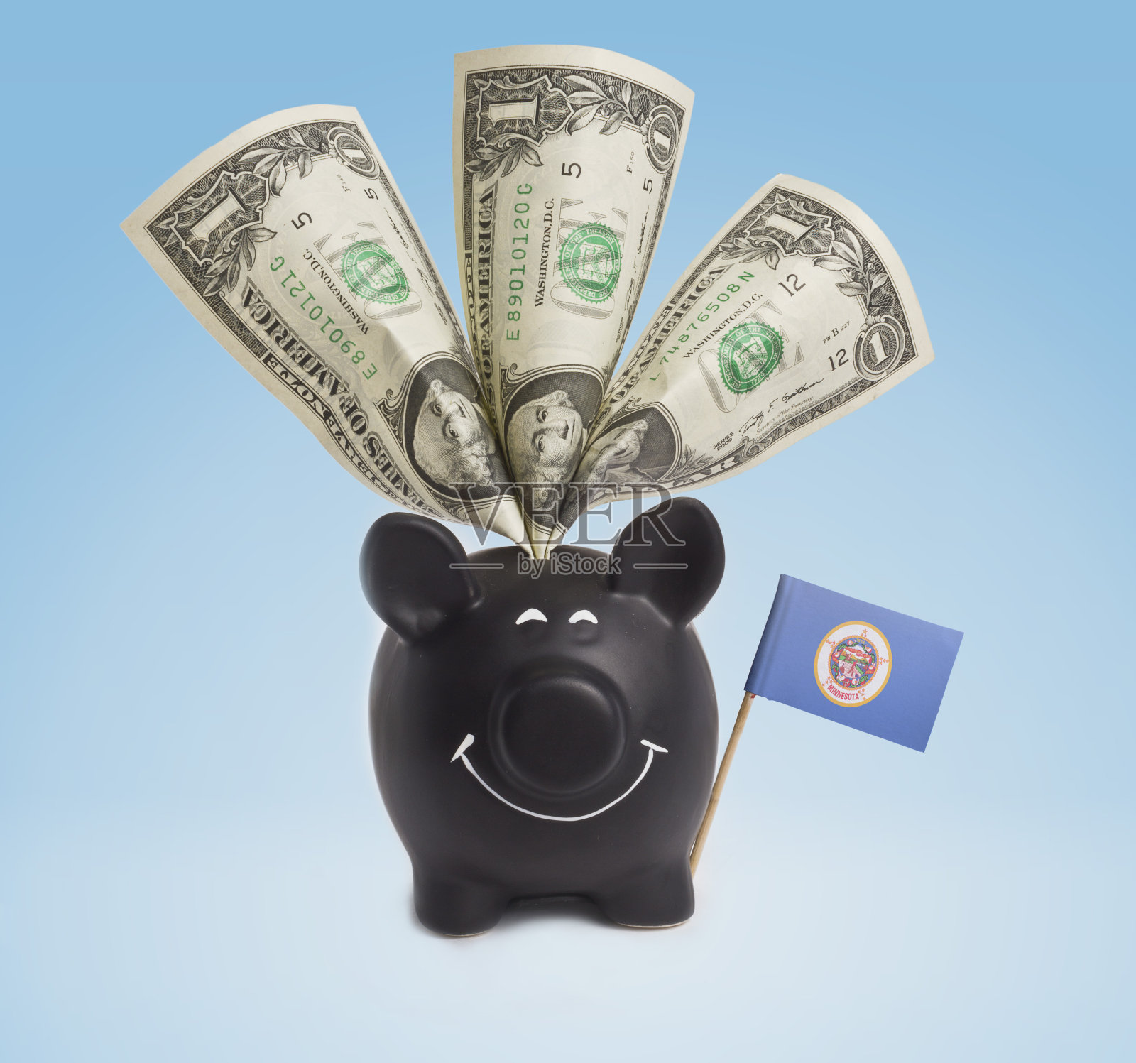 明尼苏达州快乐储蓄罐里的一美元钞票(系列)照片摄影图片