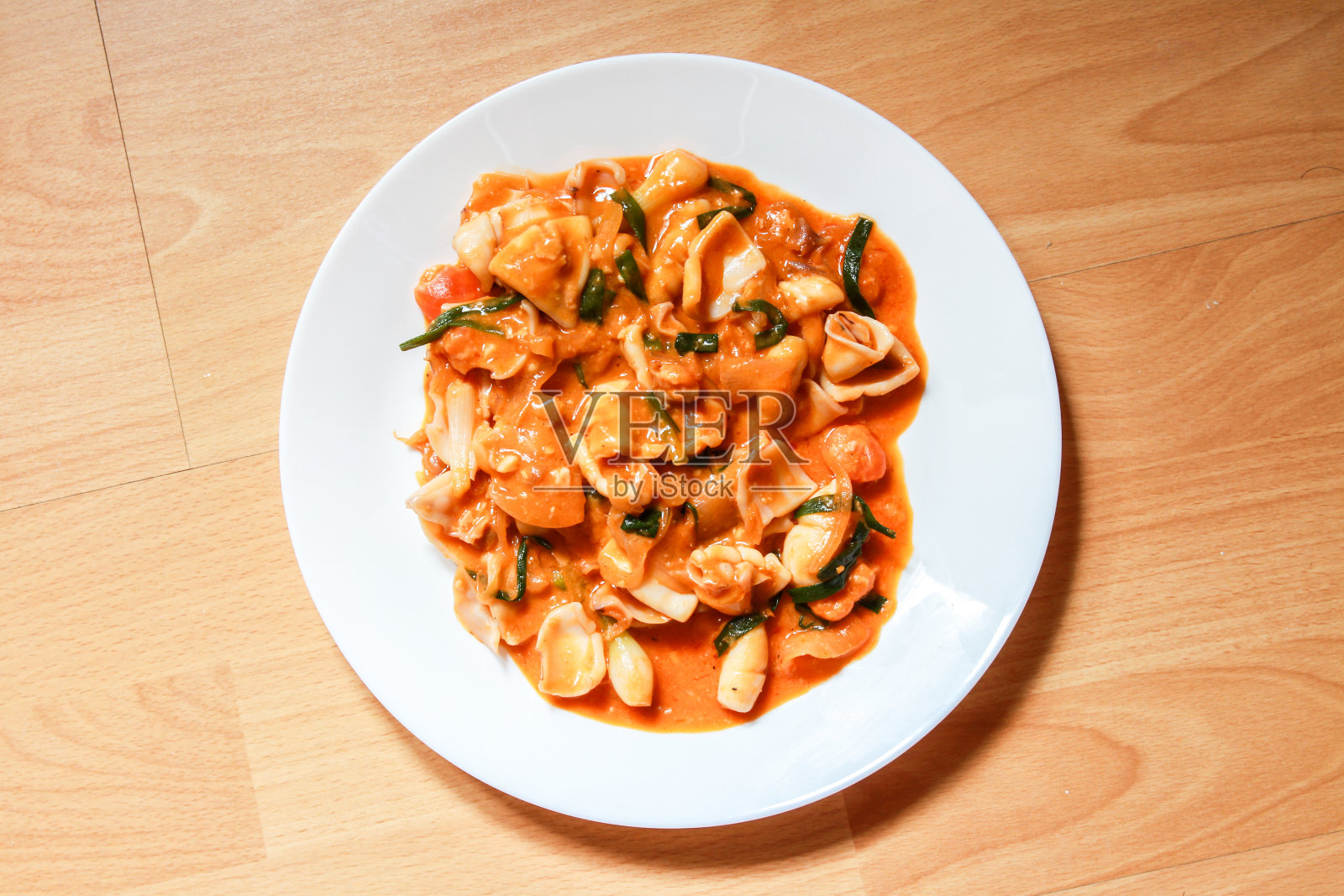 咸蛋约克炒鱿鱼照片摄影图片