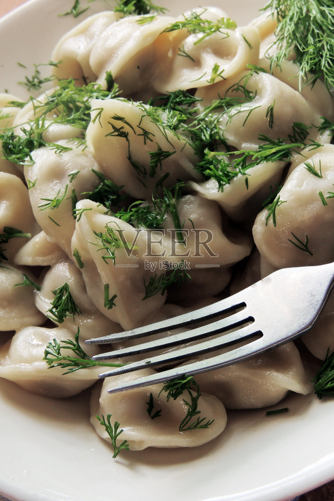 肉和香草饺子照片摄影图片