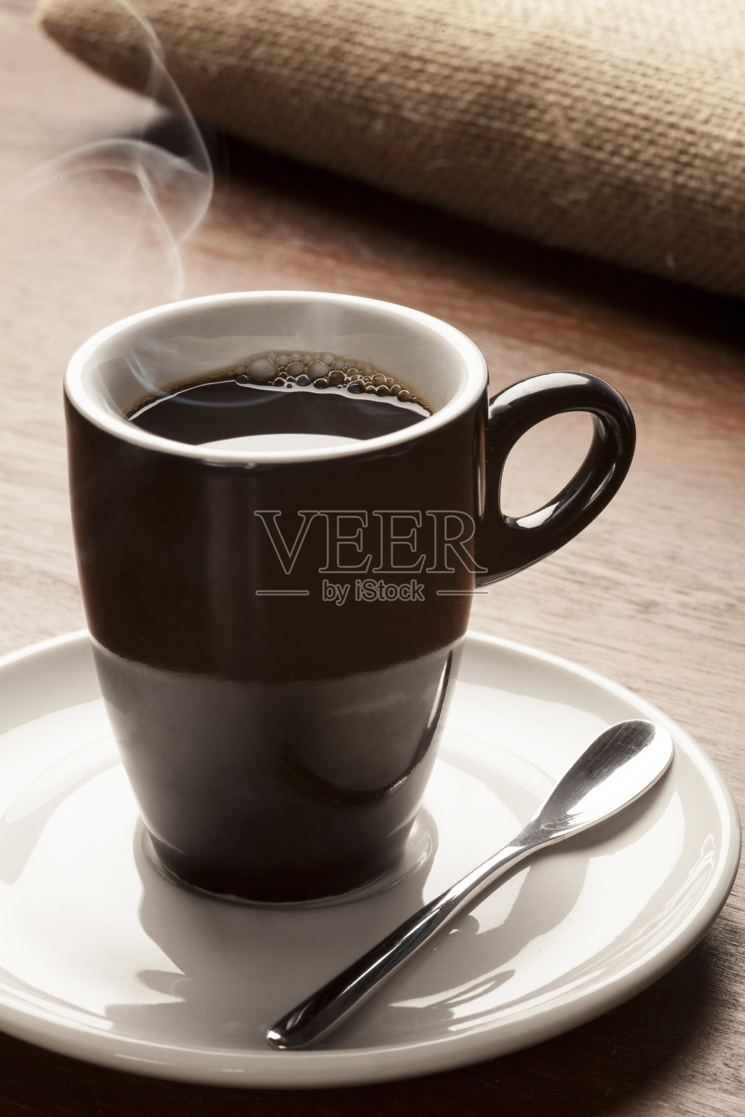 咖啡吗?热的x?黑脸和盘子照片摄影图片