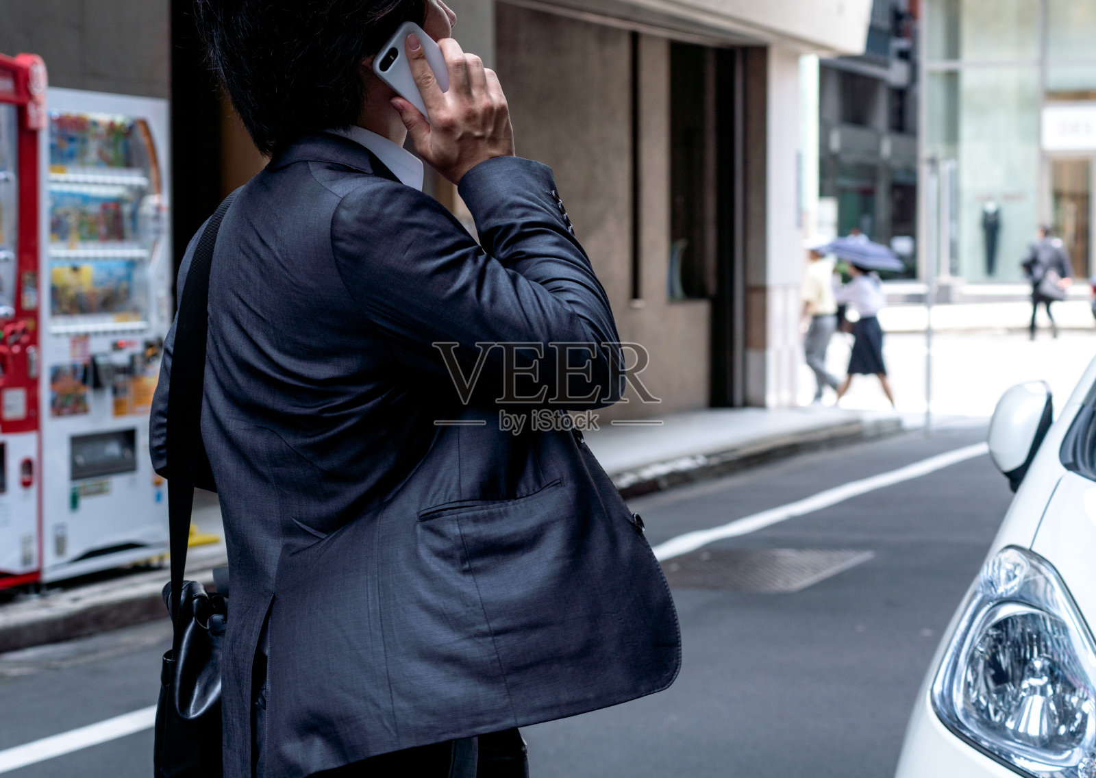 Asaian商人叫照片摄影图片