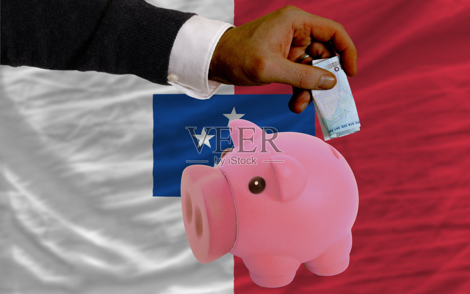 把欧元换成存钱罐和弗朗斯维尔旗照片摄影图片