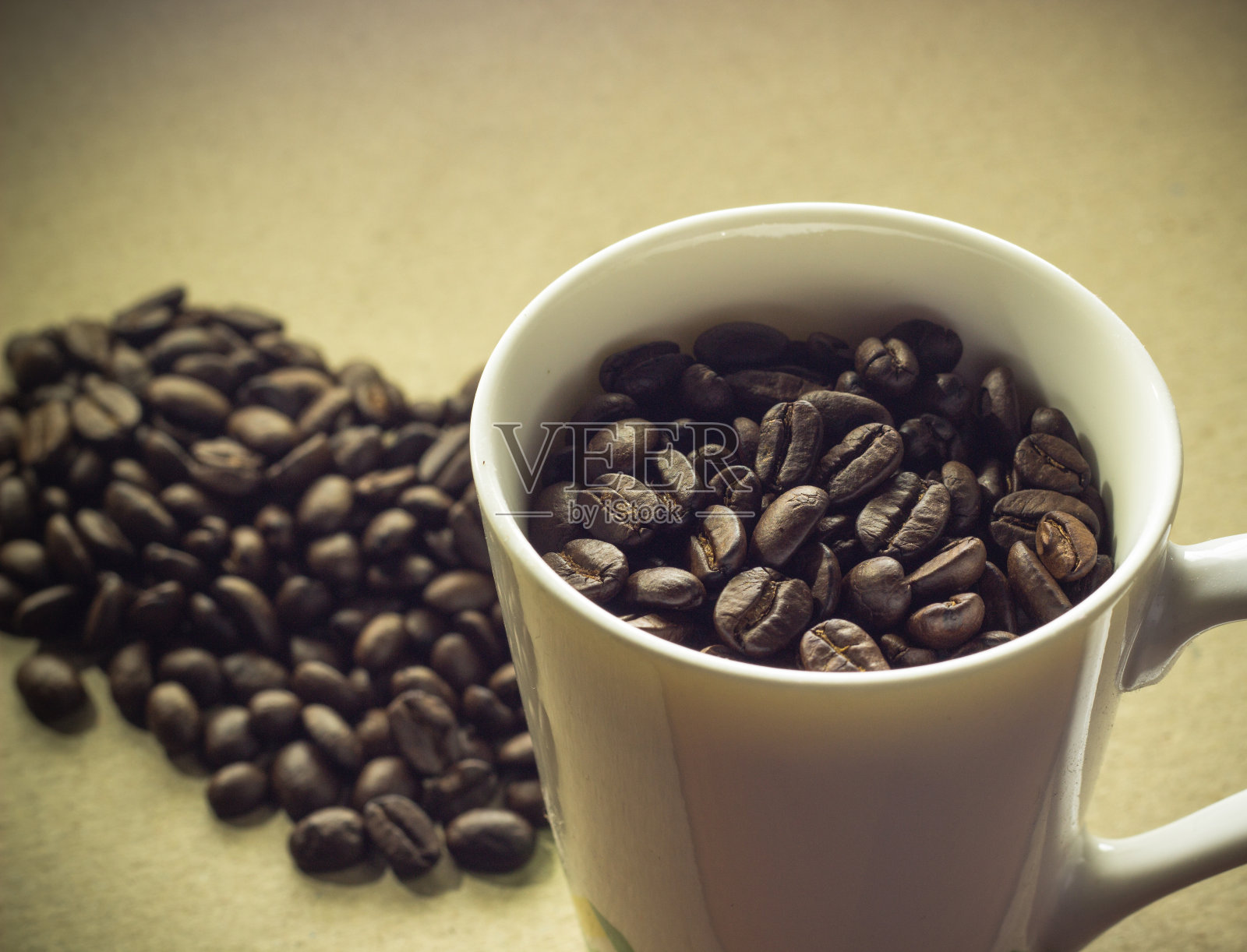 咖啡杯和豆子照片摄影图片