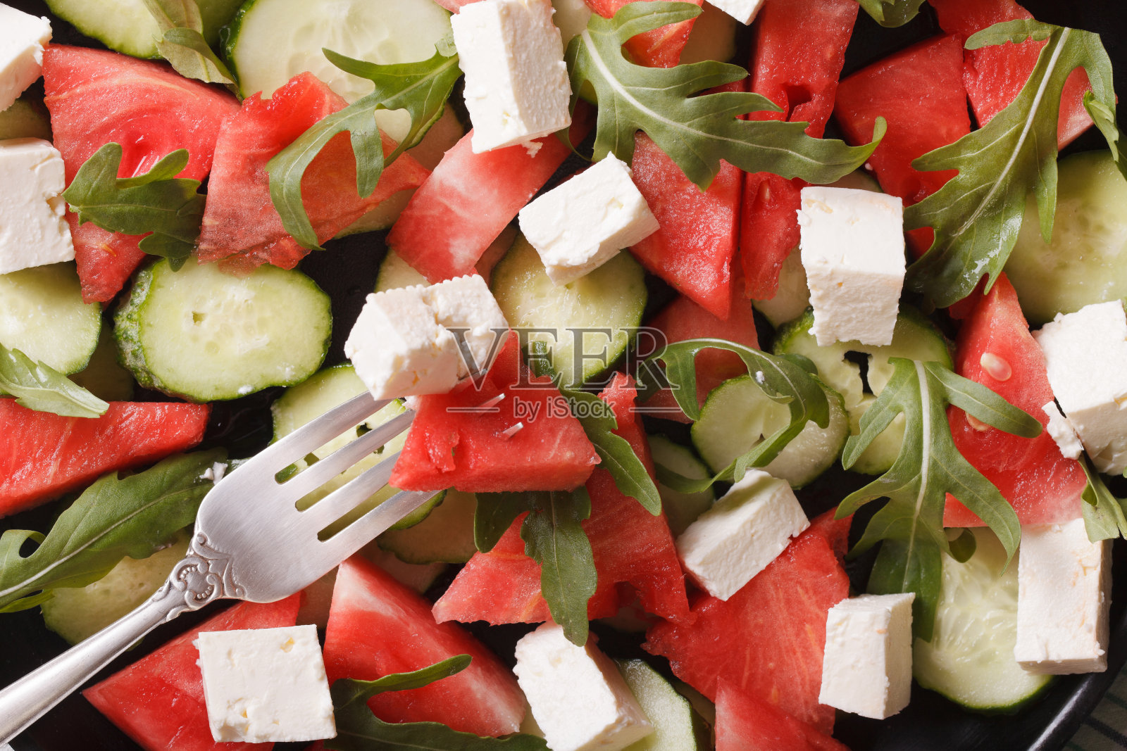 背景:西瓜沙拉宏。水平的俯视图照片摄影图片