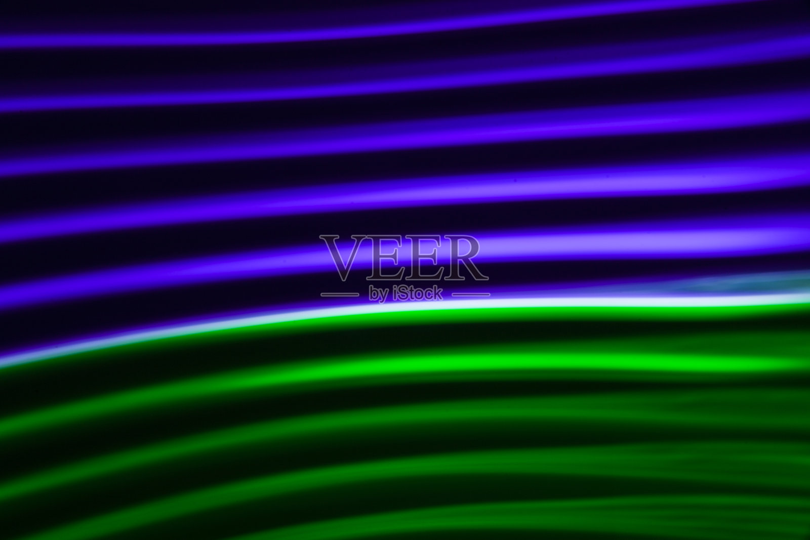 霓虹灯在黑暗中,抽象的背景不寻常照片摄影图片