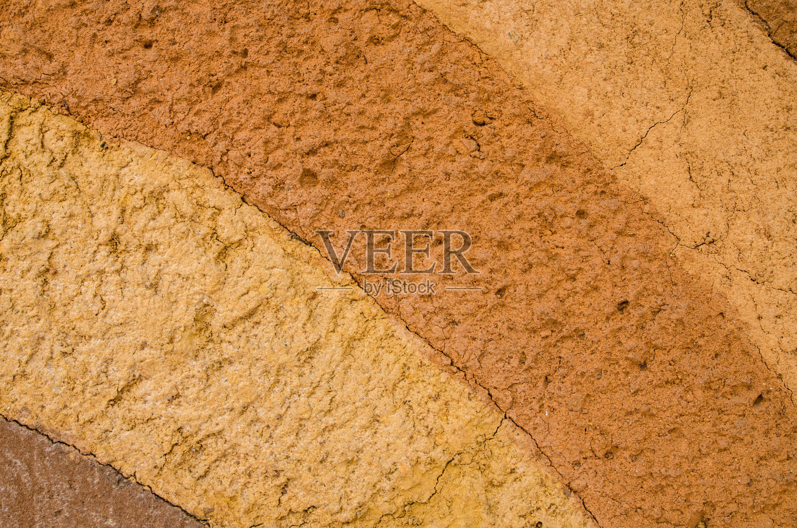 干土表面用石头开裂。照片摄影图片
