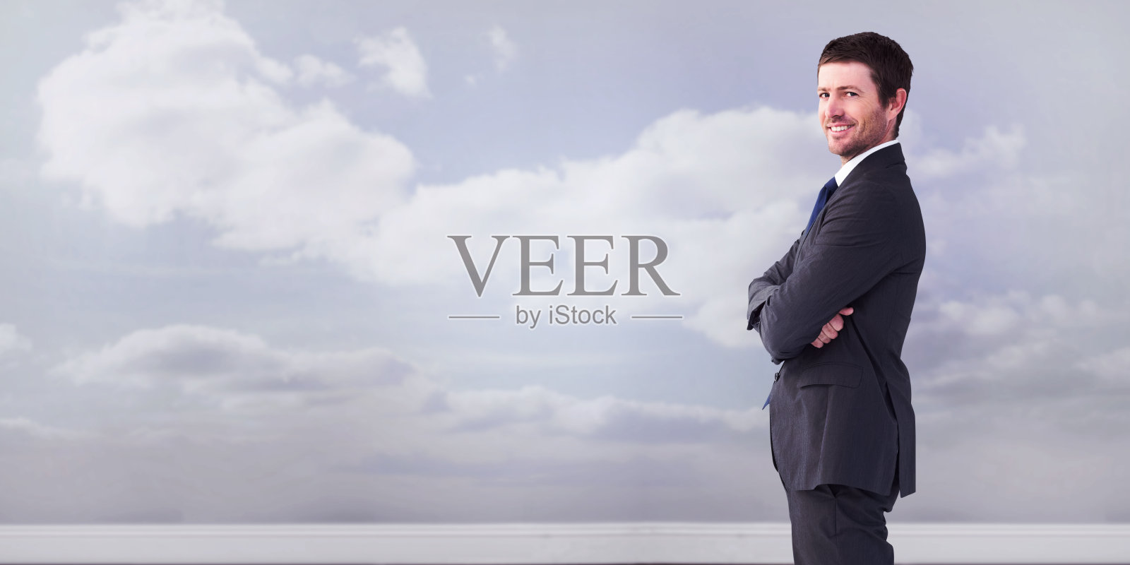 商人双臂交叉站着的合成图像照片摄影图片