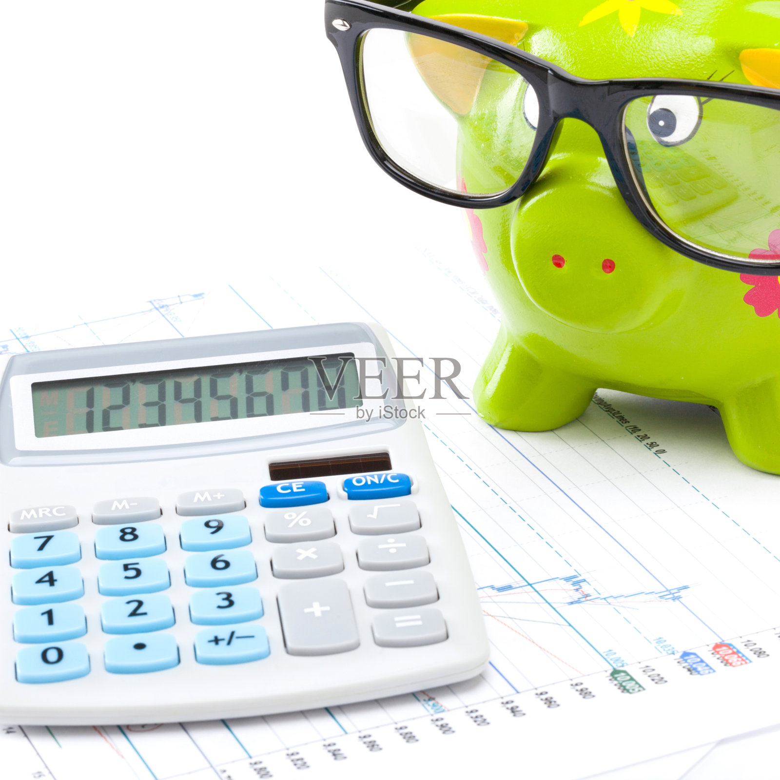 股市走势图与小猪储蓄罐工作室拍摄照片摄影图片