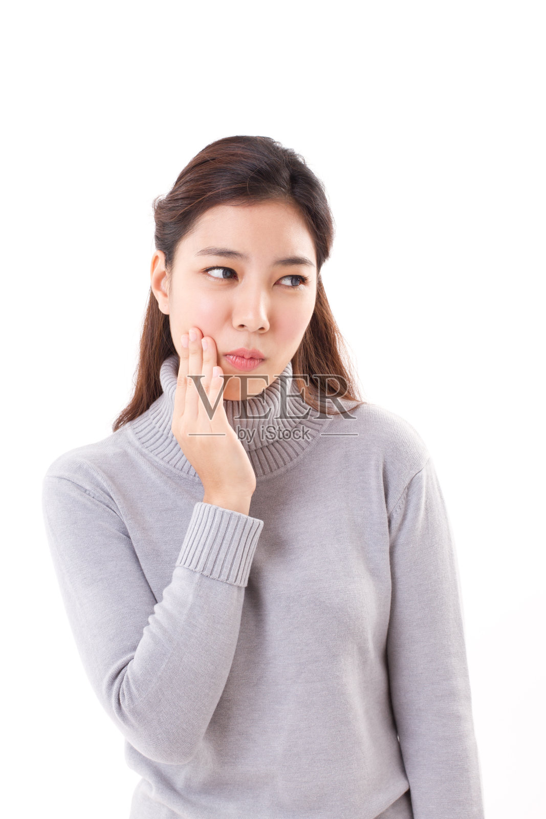 女人牙疼,冬天穿衣服照片摄影图片