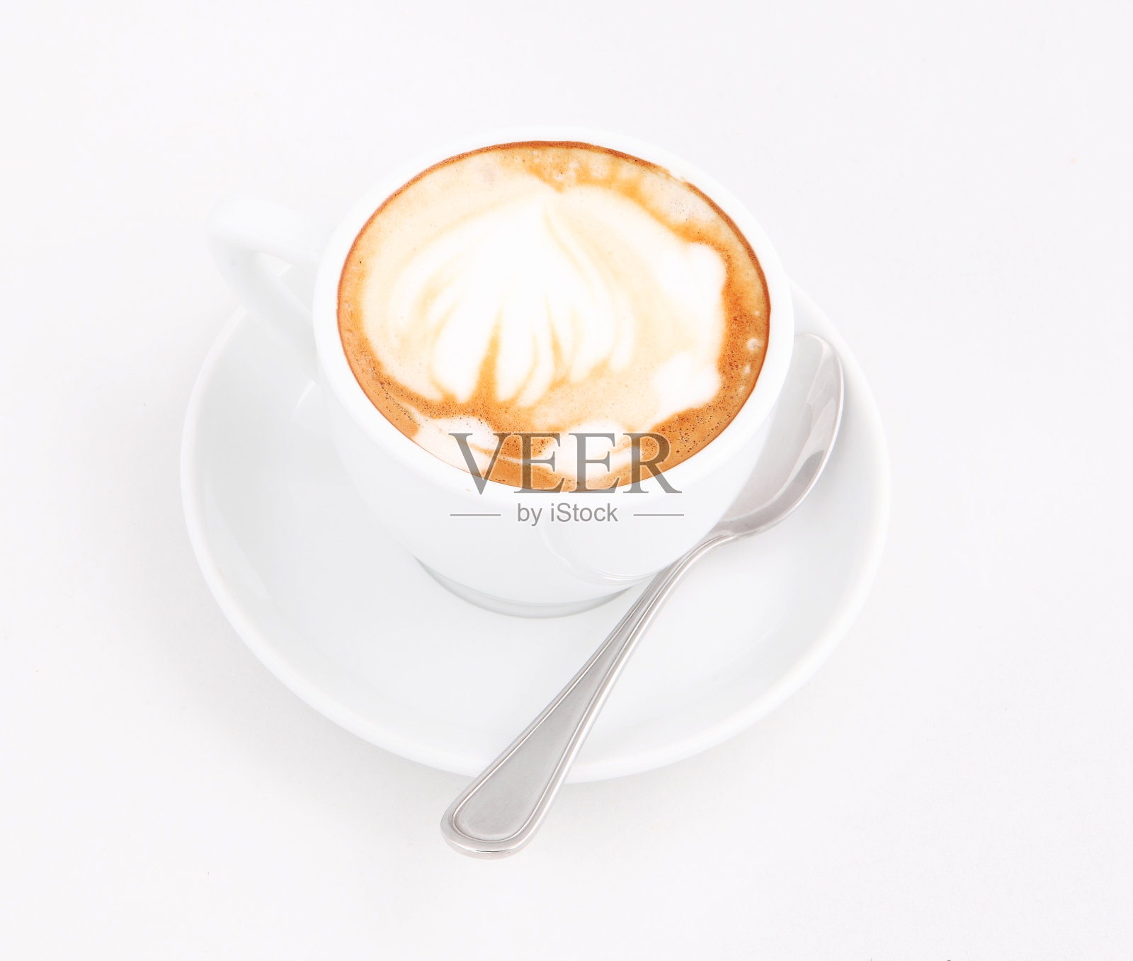 一杯有图案的卡布奇诺照片摄影图片