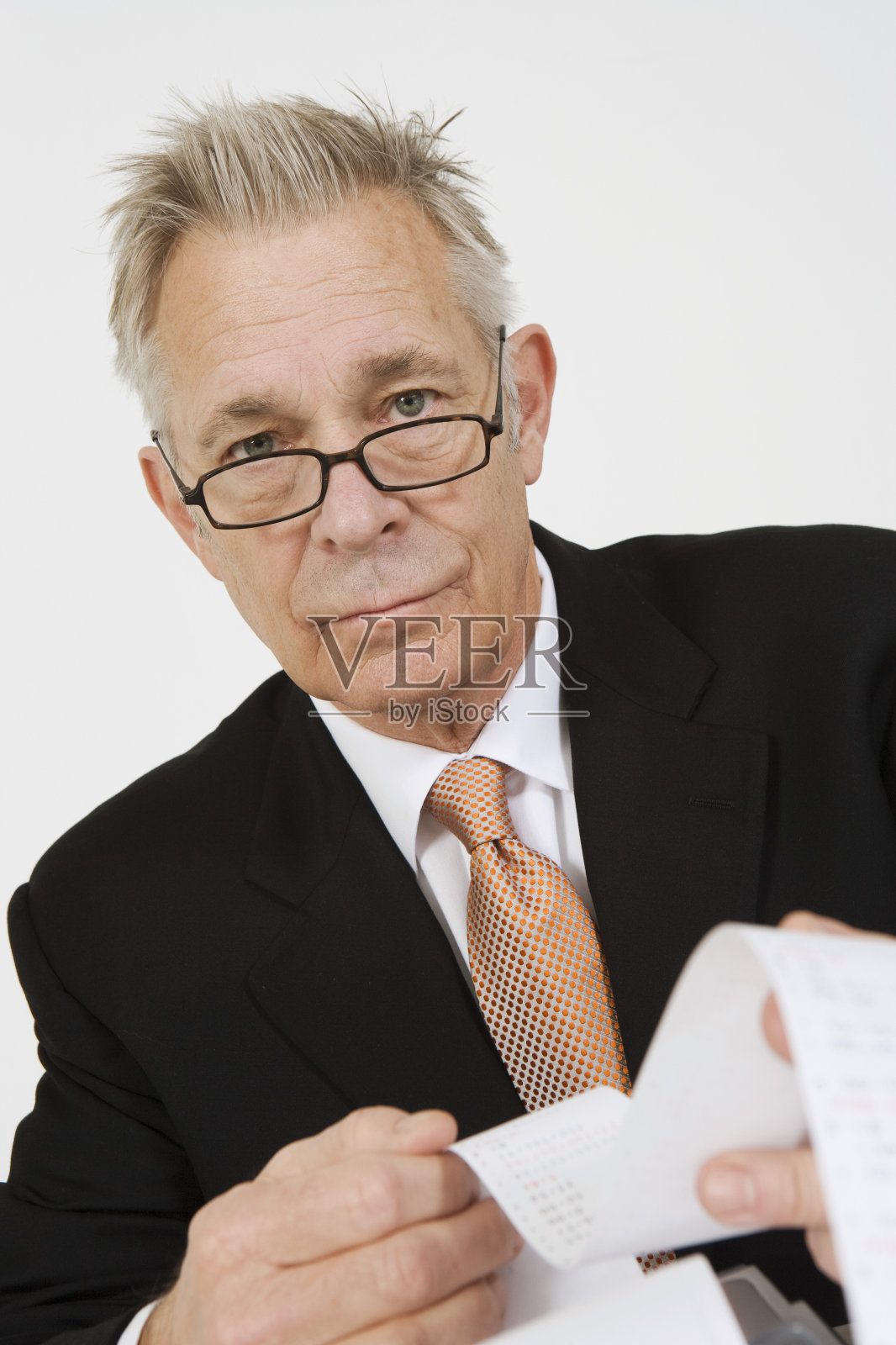 商人与计算器纸带照片摄影图片