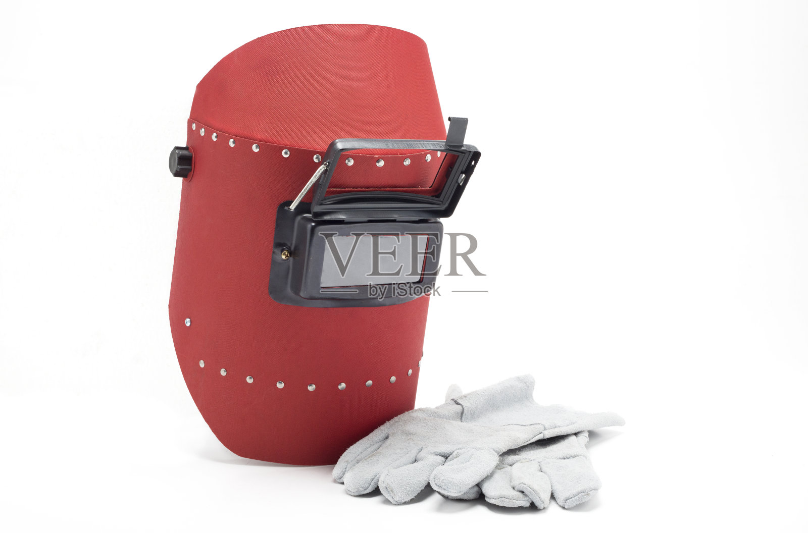 白色背景上的焊接面罩和手套。照片摄影图片