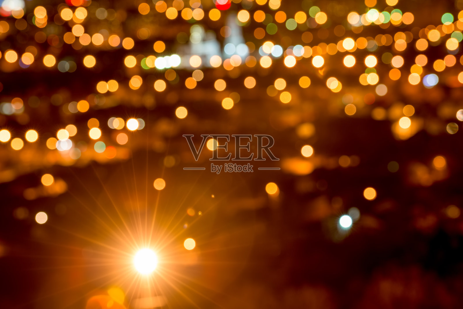 抽象的圆形散景背景,暮色中的城市灯光照片摄影图片