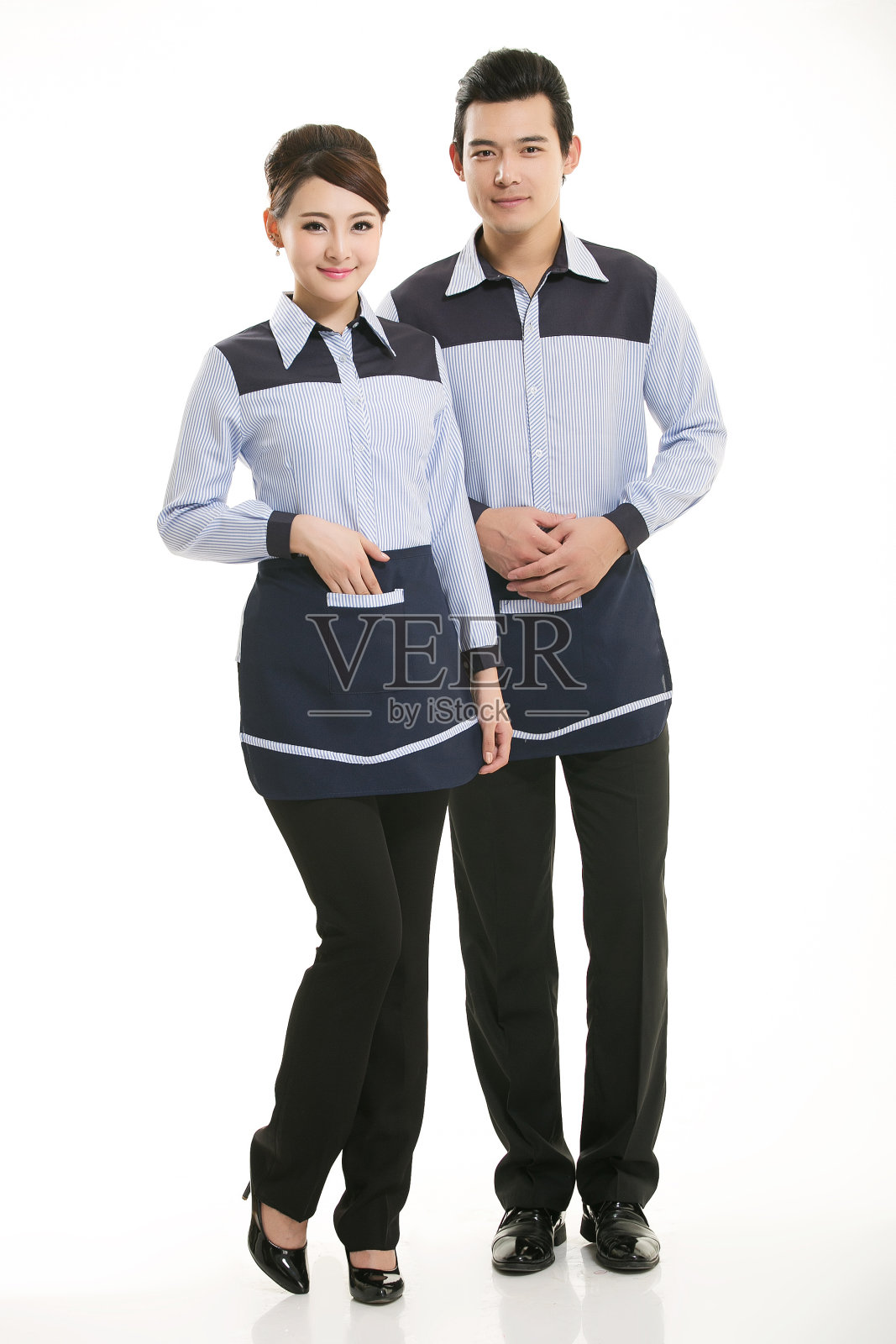 穿着服装职业中国服务员在白色的背景照片摄影图片