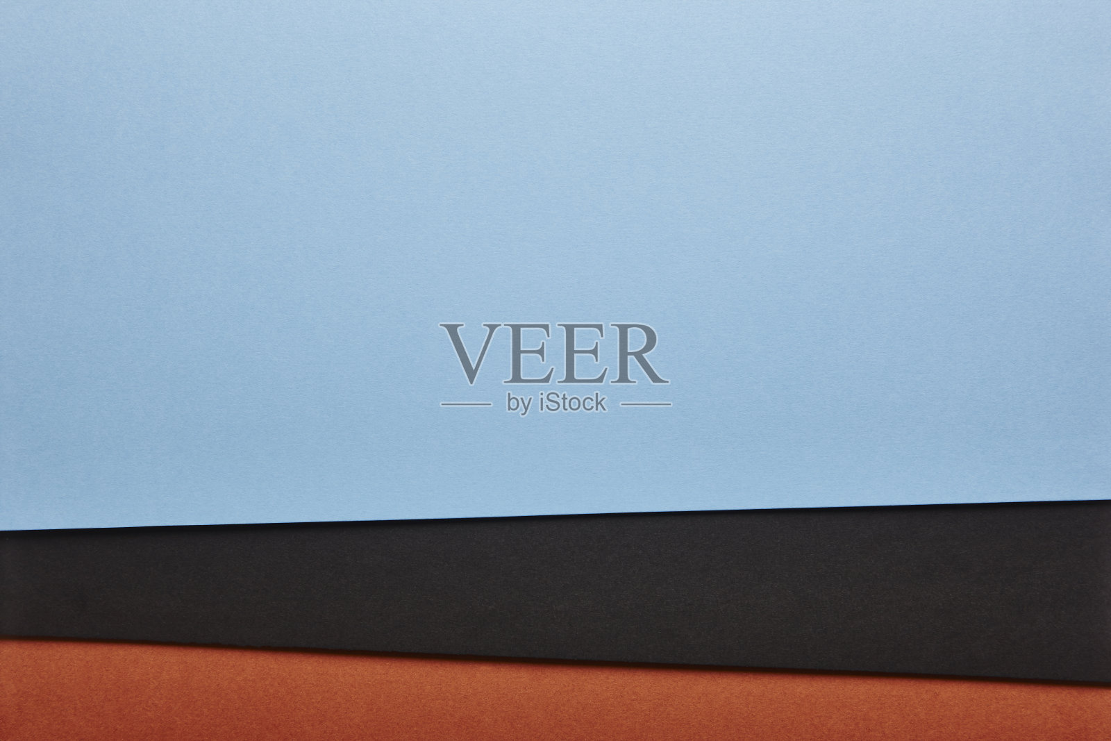 彩色硬纸板背景在蓝色,黑色,棕色调。复制水疗照片摄影图片