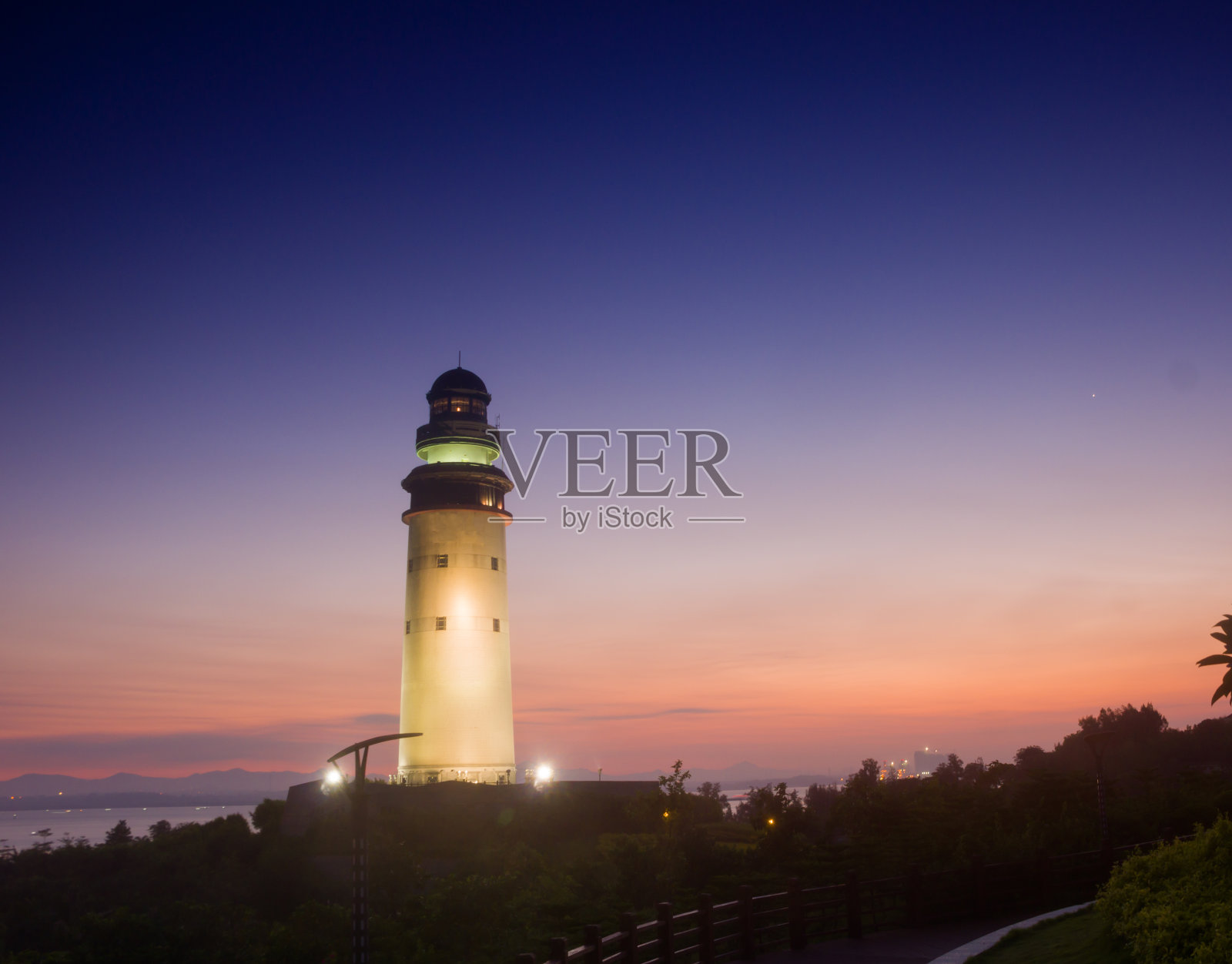 灯塔在黎明照片摄影图片