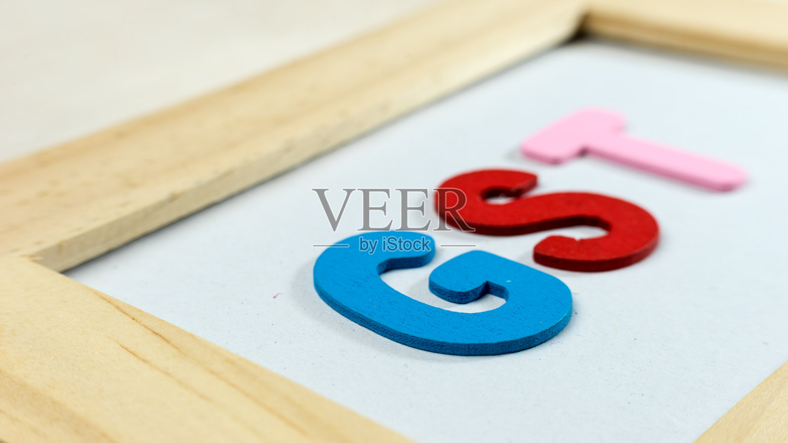 商品和服务税的英文字母照片摄影图片