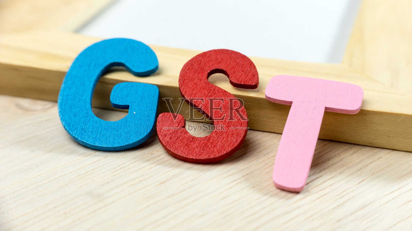 商品和服务税的英文字母照片摄影图片