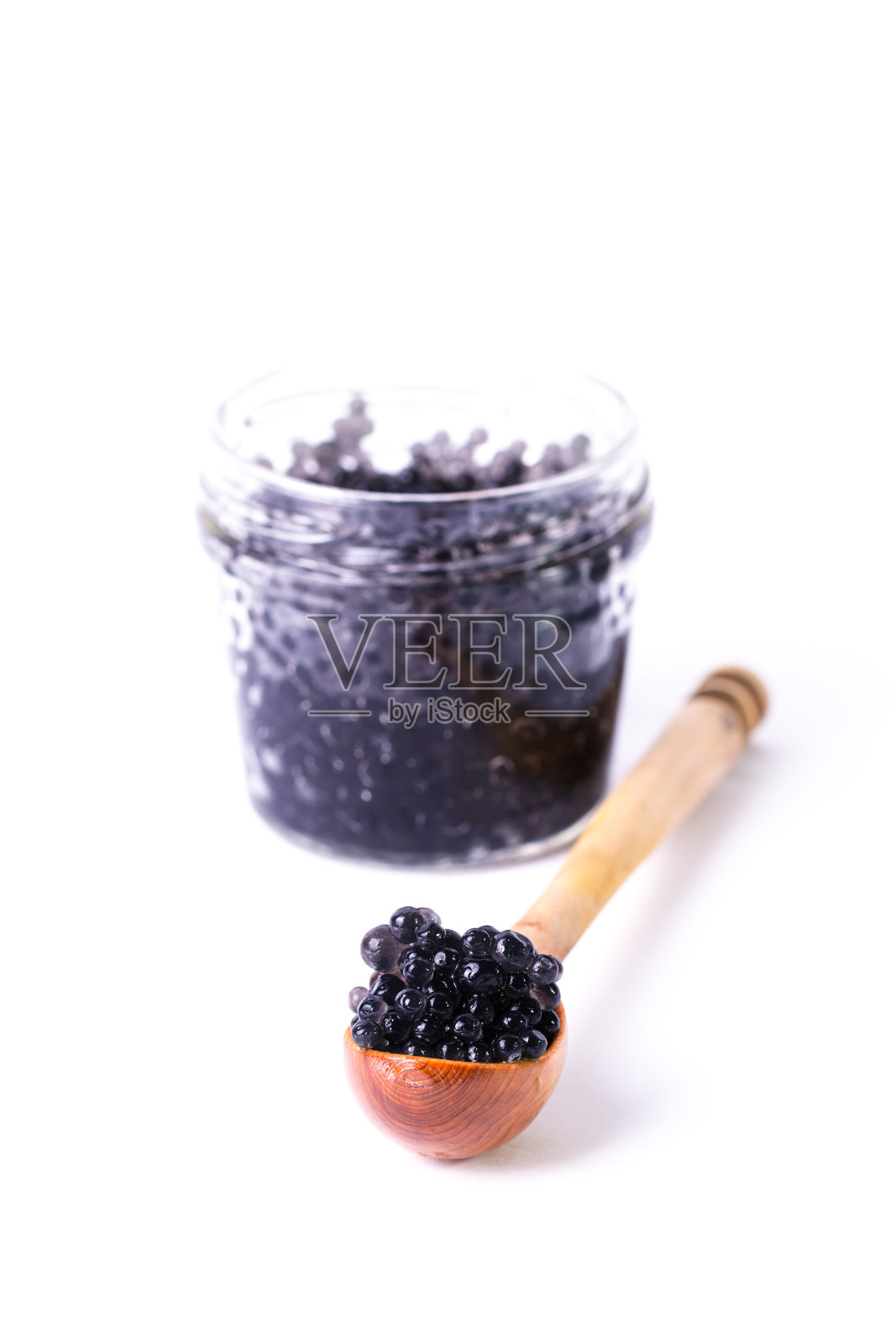 勺子里的鱼子酱照片摄影图片