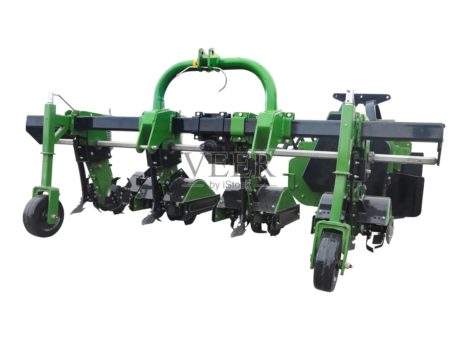 新型农用中耕机为绿色,拖拉机为白色隔离犁照片摄影图片