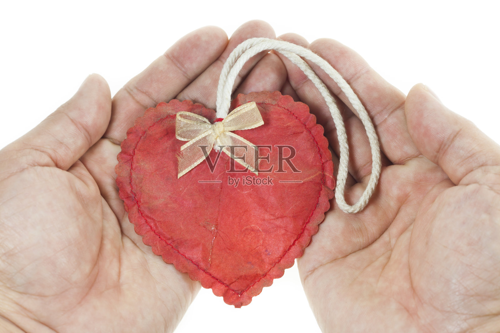 手握红心照片摄影图片