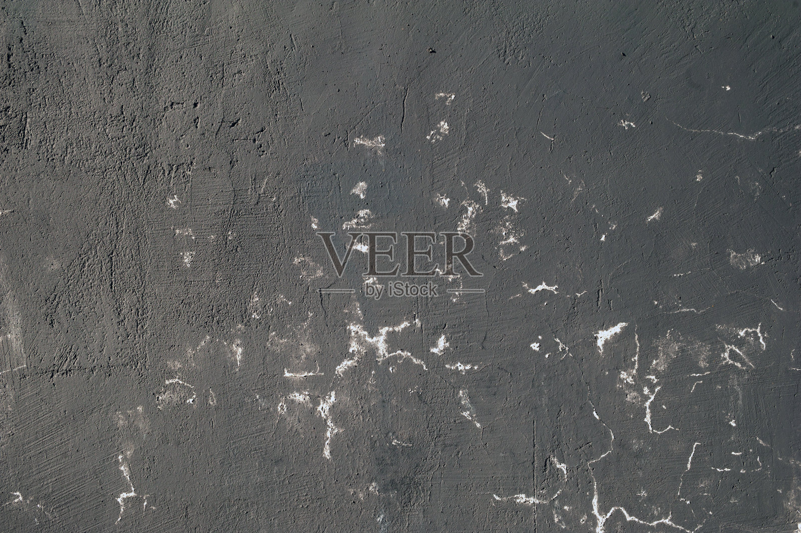 纹理的墙壁覆盖着黑色的油漆照片摄影图片