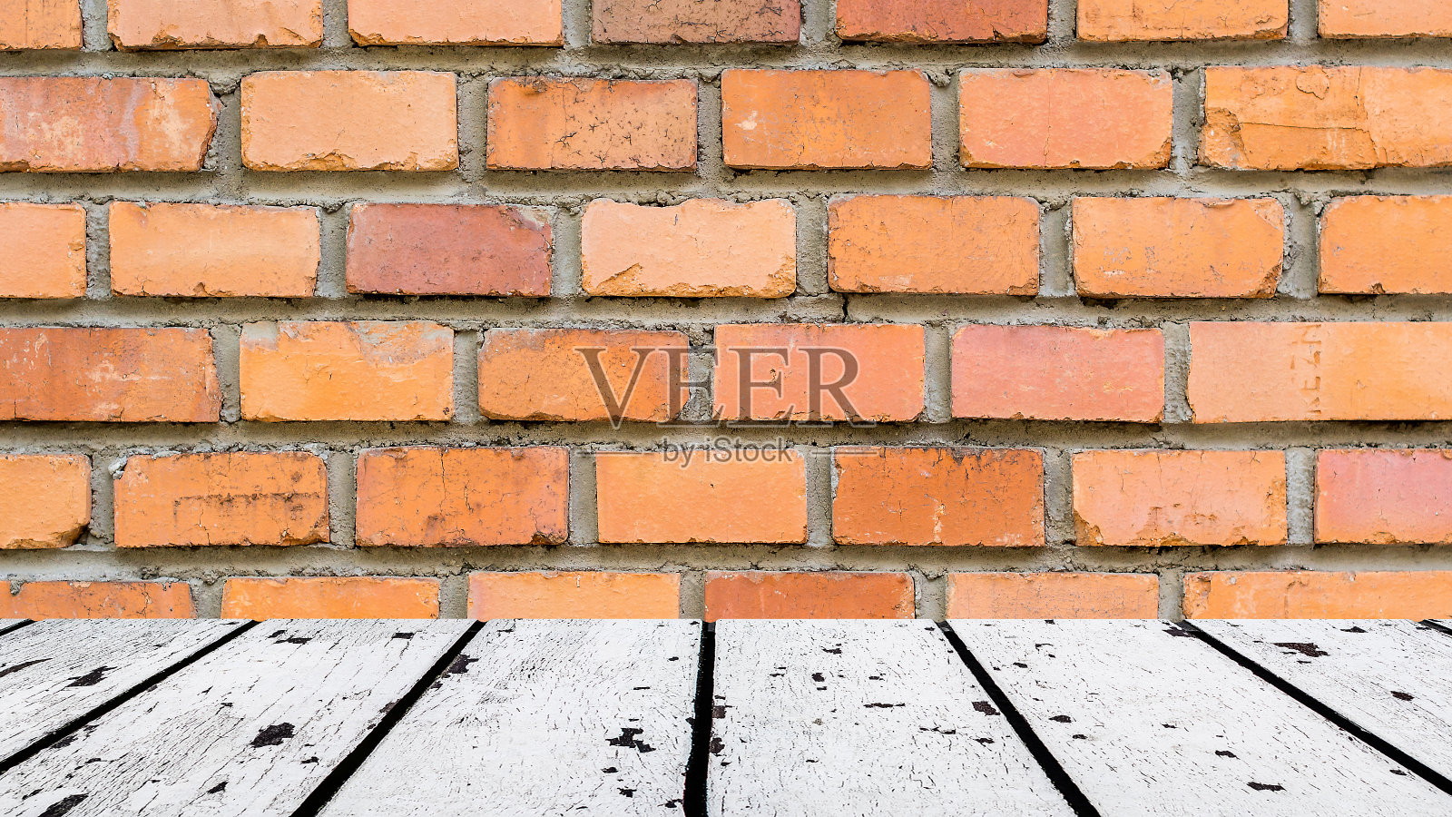 白色木地板,红色砖墙照片摄影图片